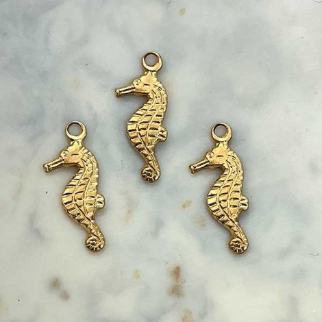 7mm Tiny Seahorse Brass Charm (left facing) - Pack of 10 7mm Tiny Seahorse Brass Charm (left facing) - Pack of 10