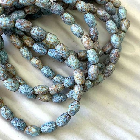 5x7mm Czech Faceted Ovals - Honey with Picasso Finish & Turquoise Wash - Pack of 10 5x7mm Czech Faceted Ovals - Honey with Picasso Finish & Turquoise Wash - Pack of 10