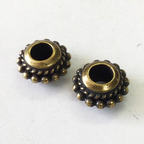 11x4mm TierraCast Beaded Twist Euro Beads with 4mm hole - Brass Oxide - Pack of 2 11x4mm TierraCast Beaded Twist Euro Beads with 4mm hole - Brass Oxide - Pack of 2