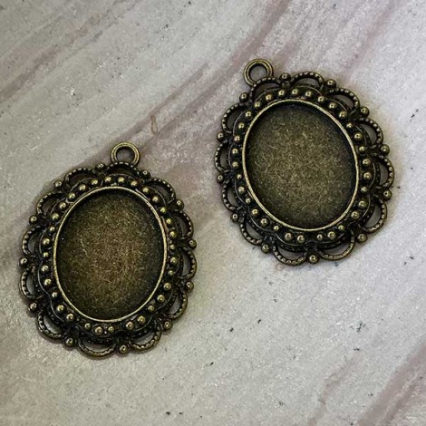 23x31mm Ant Bronze Filigree Oval Cab Pendant Frame - Pack of 4 23x31mm Ant Bronze Filigree Oval Cab Pendant Frame - Pack of 4