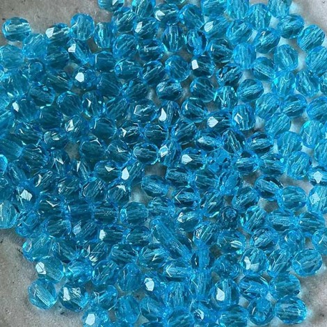 4mm Czech Firepolish Beads - Aquamarine - Pack of 50 4mm Czech Firepolish Beads - Aquamarine - Pack of 50