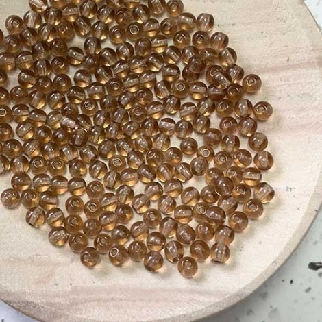 4mm Czech Smokey Topaz Round Beads - Pack of 100 4mm Czech Smokey Topaz Round Beads - Pack of 100