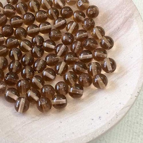 6mm Smokey Topaz Czech Round Glass Druk Beads - Pack of 20 6mm Smokey Topaz Czech Round Glass Druk Beads - Pack of 20
