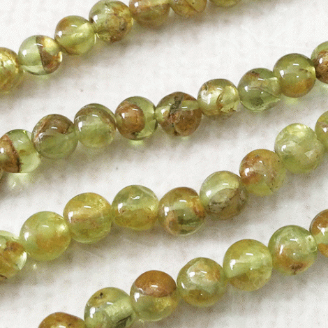 4-5mm Peridot Hand-Cut Round Beads - Strand