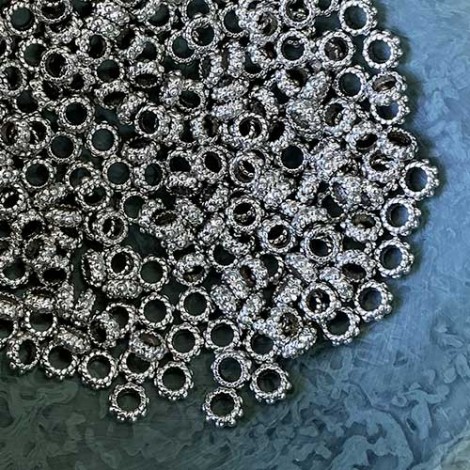 6x3mm (3mm ID) Tibetan Style Ant Silver Flower Spacers - Pack of 50